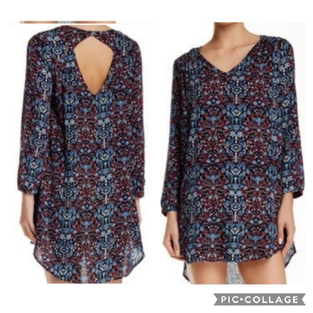 Lush shift dress with cut out back design.